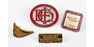 Badge in metallo finitura sabbiata